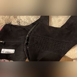 New boots black with heals never worn  size 12